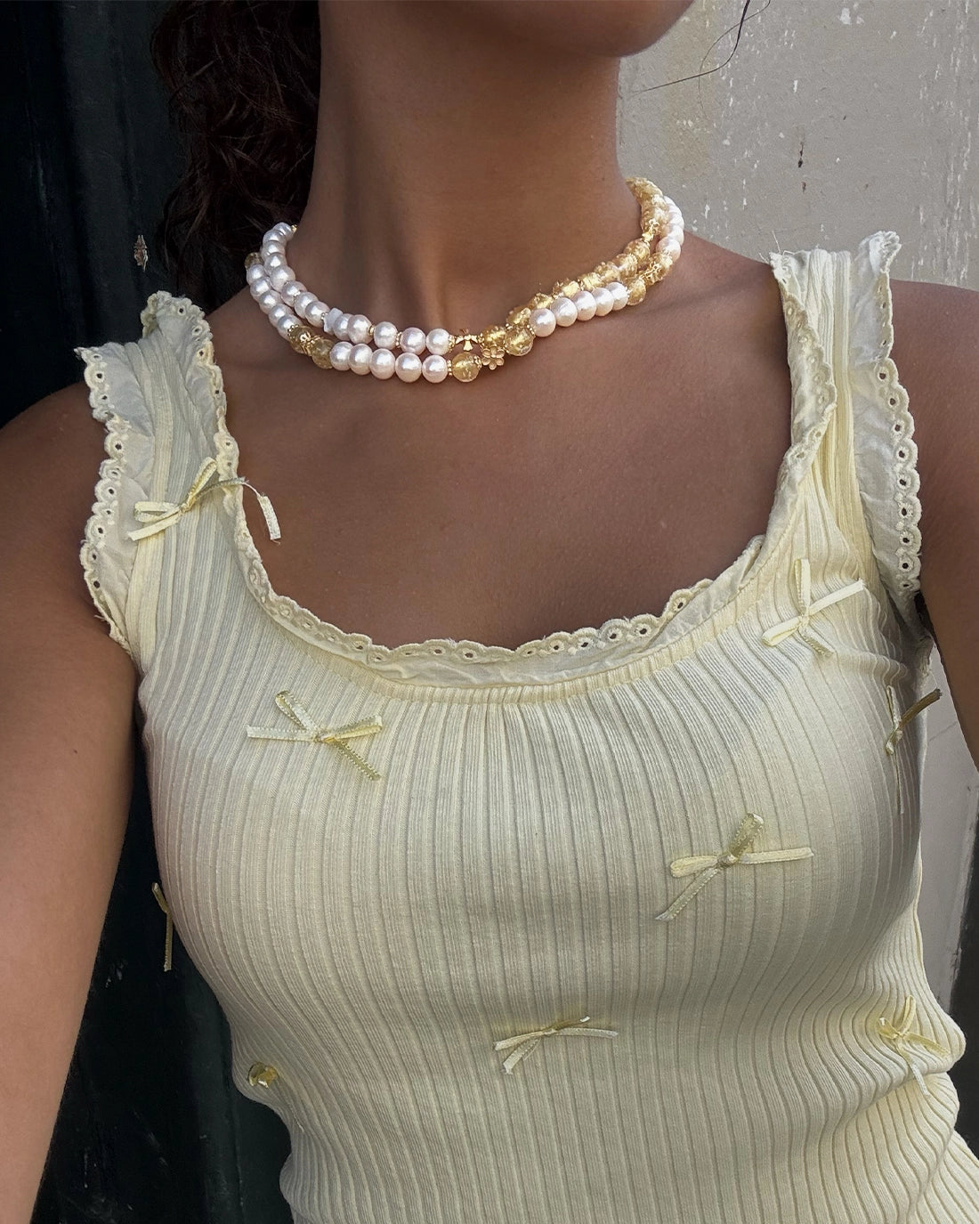 collier de perles phosphorescent doré